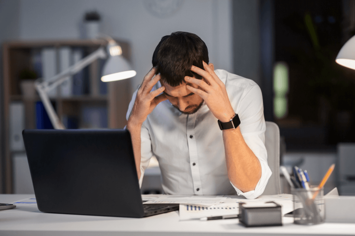 Person overwhelmed by stress