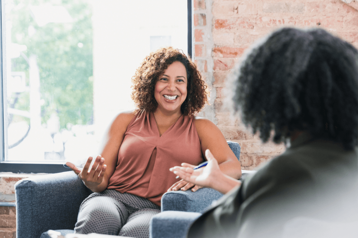 Therapist and client working through cognitive behavioral therapy