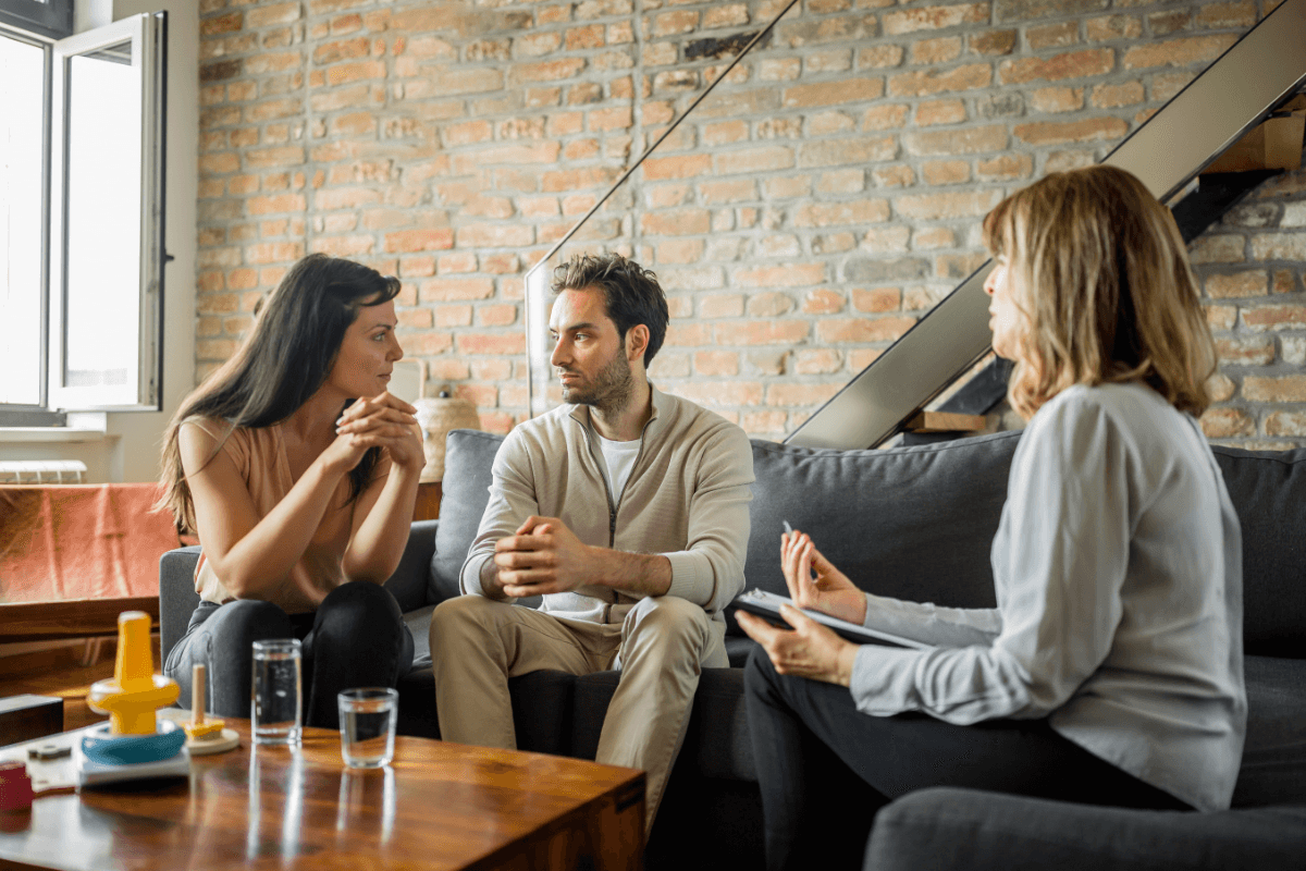 Couple in a therapy session with a counselor